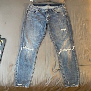 Silver super skinny ripped jeans. Never worn.